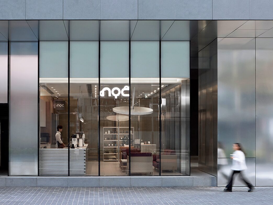 NOC Cheung Sha Wan glass storefront framed by metallic panels on King Lam Street