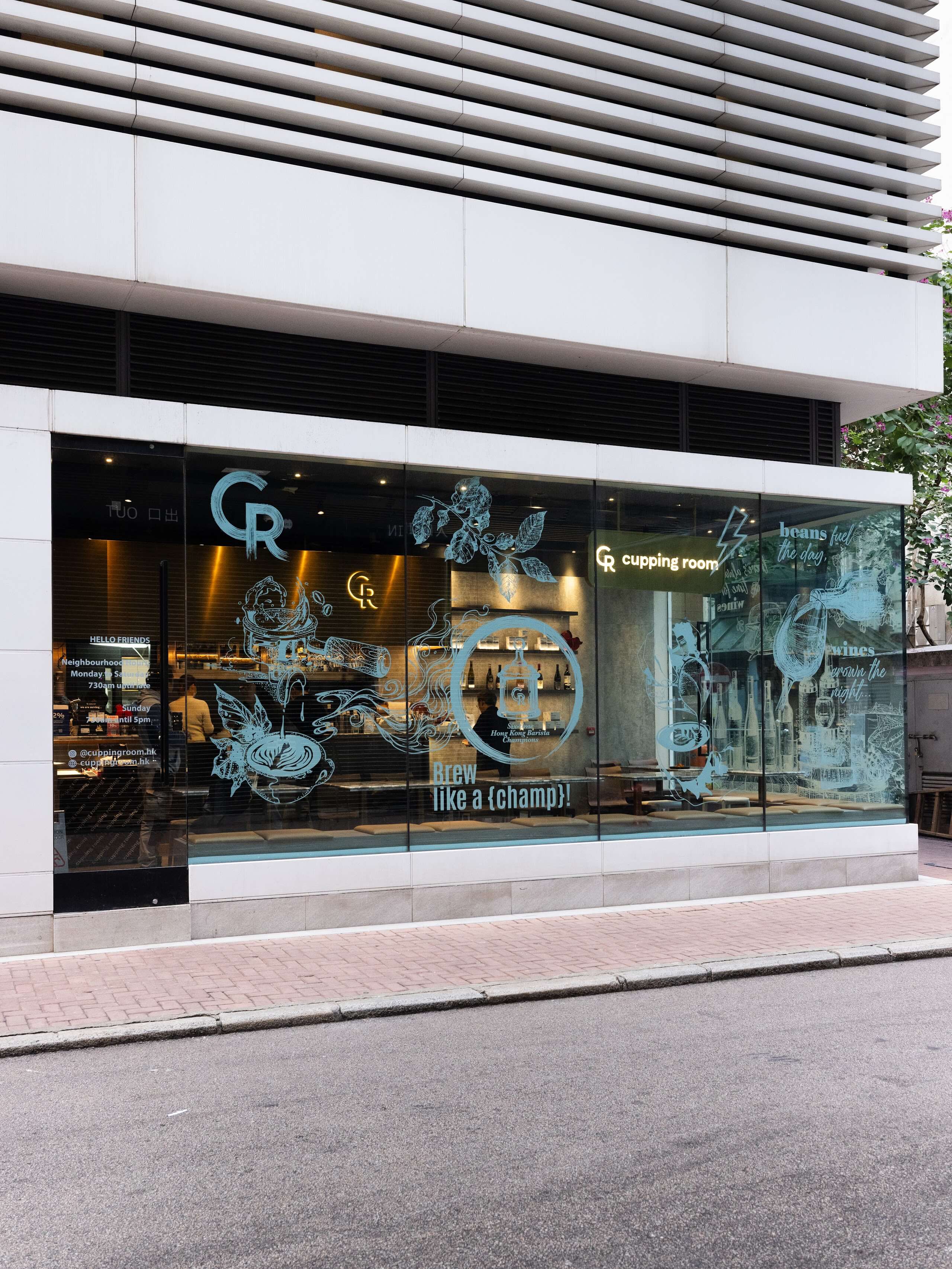 Cupping Room’s illustrated glass frontage in the white-clad Jervois building in Sheung Wan.